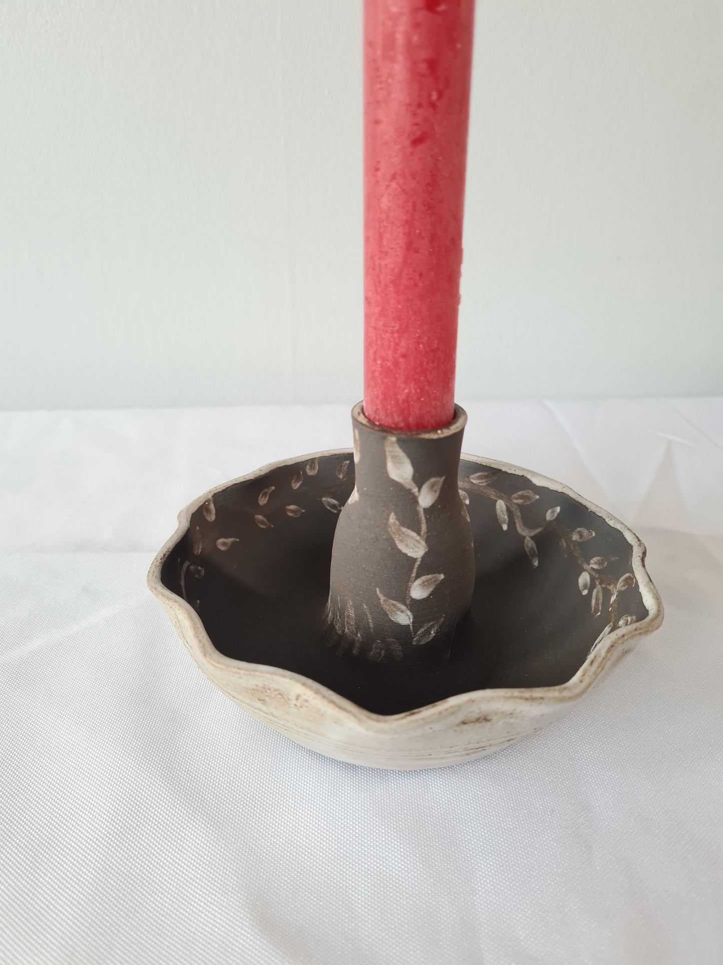 Candle holder, raised floral